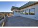 Large patio area featuring a modern design and mountain views at 37 Reflection Shores Ln, Henderson, NV 89011