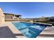 Enjoy this backyard pool with water features and a spa, perfect for relaxation and outdoor entertaining at 37 Reflection Shores Ln, Henderson, NV 89011