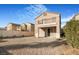 Two story home with backyard patio and gravel at 3817 Bella Legato Ave, North Las Vegas, NV 89081