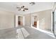 Bedroom with ceiling fan and ensuite bathroom access at 3817 Bella Legato Ave, North Las Vegas, NV 89081