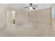 Large bedroom with ceiling fan and access to hallway and bath at 3817 Bella Legato Ave, North Las Vegas, NV 89081