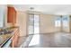 Bright kitchen with sliding door access to backyard patio at 3817 Bella Legato Ave, North Las Vegas, NV 89081