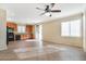 Kitchen with wood cabinets, black appliances, and tile floor at 3817 Bella Legato Ave, North Las Vegas, NV 89081