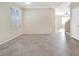 Spacious living room with tile flooring and large windows at 3817 Bella Legato Ave, North Las Vegas, NV 89081