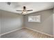 Charming bedroom with ceiling fan and large window at 3834 S Sandhill Rd, Las Vegas, NV 89121