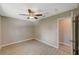 Light and airy bedroom featuring wood-look floors at 3834 S Sandhill Rd, Las Vegas, NV 89121