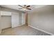 Bright bedroom with mirrored closet and wood-look floors at 3834 S Sandhill Rd, Las Vegas, NV 89121