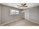 Spacious bedroom with mirrored closet and ceiling fan at 3834 S Sandhill Rd, Las Vegas, NV 89121