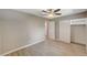 Bright bedroom with wood-look floors and spacious closet at 3834 S Sandhill Rd, Las Vegas, NV 89121