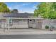 Home exterior showcasing a carport and solar panels at 3834 S Sandhill Rd, Las Vegas, NV 89121