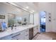 Luxurious bathroom with double vanity and marble flooring at 5378 Pendini Point Ct, Las Vegas, NV 89141