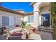 Charming courtyard with seating area and lush plants at 5378 Pendini Point Ct, Las Vegas, NV 89141