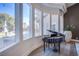 Bright living area with bay windows overlooking the pool at 5378 Pendini Point Ct, Las Vegas, NV 89141