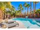 Relaxing pool with spa and lounge chairs at 5378 Pendini Point Ct, Las Vegas, NV 89141