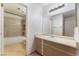 Updated bathroom with a large vanity and tub shower combo at 6750 Del Rey Ave # 122, Las Vegas, NV 89146