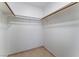 Walk-in closet with double rods and shelving at 6750 Del Rey Ave # 122, Las Vegas, NV 89146