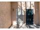 Two-unit townhouse entry with security doors at 6750 Del Rey Ave # 122, Las Vegas, NV 89146