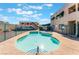 Community pool with kidney-shape design and surrounding patio at 6750 Del Rey Ave # 122, Las Vegas, NV 89146