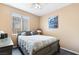 Charming bedroom with a full-size bed and world map bedding at 7348 Zion Falls St, Las Vegas, NV 89131