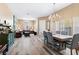 Open concept dining room and living area with hardwood floors at 7348 Zion Falls St, Las Vegas, NV 89131