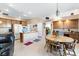 Kitchen with an island, wood cabinetry and breakfast nook at 7348 Zion Falls St, Las Vegas, NV 89131