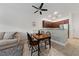 Dining area with a table and chairs, adjacent to kitchen at 7544 Nicklin St, Las Vegas, NV 89143