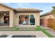 View of backyard with pool and patio, featuring a covered patio and grassy areas at 7563 Saguaro Cactus Ave, Las Vegas, NV 89178