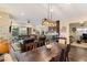 Open concept dining room with view of living room and kitchen at 7563 Saguaro Cactus Ave, Las Vegas, NV 89178