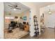 Bright home office features built-in shelving and hardwood floors at 7563 Saguaro Cactus Ave, Las Vegas, NV 89178