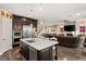 Open concept kitchen with island and views to Gathering room at 7563 Saguaro Cactus Ave, Las Vegas, NV 89178