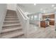 Carpeted staircase leading to the upper level of the home at 7564 Daniel Boone Ct, Las Vegas, NV 89166