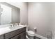 Clean bathroom with toilet, sink, and vanity at 8990 Rolling Pietra St, Las Vegas, NV 89166