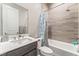 Bathroom with modern vanity and shower/tub combo at 8990 Rolling Pietra St, Las Vegas, NV 89166