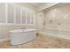 Bathroom with free-standing tub and walk-in shower at 9121 Las Manaitas Ave # 401, Las Vegas, NV 89144