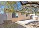 Spacious backyard with a shaded patio and gravel landscaping at 9272 Cantana St, Las Vegas, NV 89123