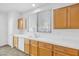 Kitchen with light wood cabinets and white countertops at 9272 Cantana St, Las Vegas, NV 89123