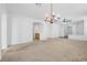 Spacious living room with chandelier and neutral colors at 9272 Cantana St, Las Vegas, NV 89123