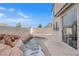 Private backyard spa with waterfall and rock landscaping at 10646 Shifting Breeze Ave, Las Vegas, NV 89129