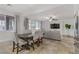 Bright dining area with large windows and seating for six at 1313 Alamosa Ridge Ct, North Las Vegas, NV 89084