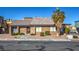 Brick building with brown accents and a palm tree at 1424 Santa Anita Dr # 112, Las Vegas, NV 89119