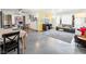 Living area with grey sofas, yellow chevron wall, and dining table at 1709 S 6Th St, Las Vegas, NV 89104