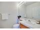 Simple bathroom with single vanity and toilet at 256 Garfield Dr, Henderson, NV 89074