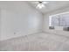Bright bedroom with a window seat and ceiling fan at 256 Garfield Dr, Henderson, NV 89074