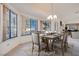 Virtually staged dining area with large windows at 256 Garfield Dr, Henderson, NV 89074