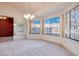 Bright dining area with large windows and a chandelier at 256 Garfield Dr, Henderson, NV 89074
