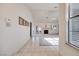 Light and bright entryway with tile flooring and view to living room at 256 Garfield Dr, Henderson, NV 89074