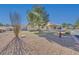 Rear view of home with gravel landscaping at 256 Garfield Dr, Henderson, NV 89074
