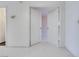 Clean hallway with light flooring and doors to other rooms at 256 Garfield Dr, Henderson, NV 89074