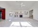 Bright living room with a fireplace and view of the kitchen at 256 Garfield Dr, Henderson, NV 89074