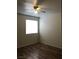 This bedroom features wood-look floors and a window that lets in ample natural light at 2725 S Nellis Blvd # 1201, Las Vegas, NV 89121